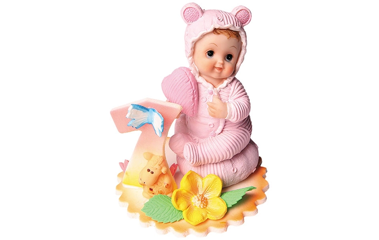Figurka cukrowa dziecka w różowym stroju